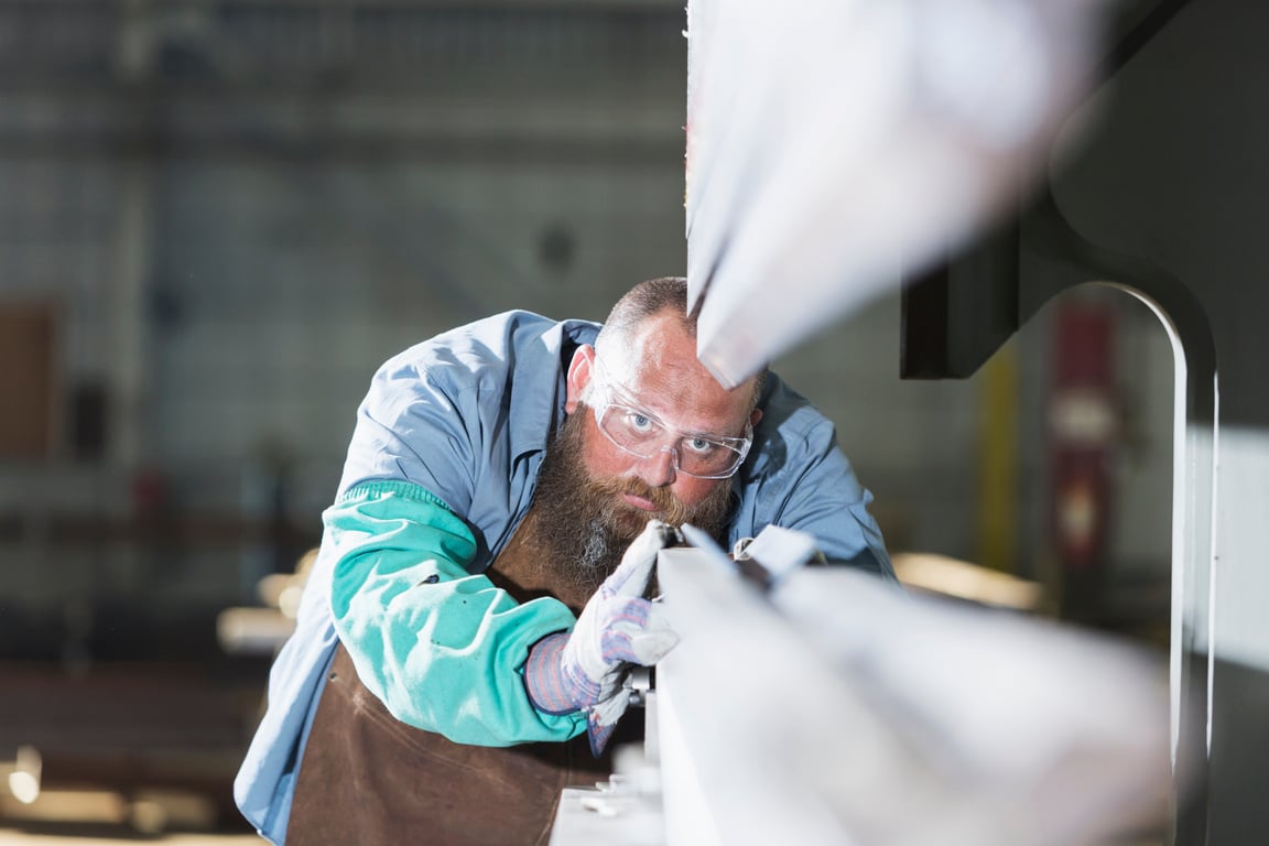 Worker in metal fabrication plant